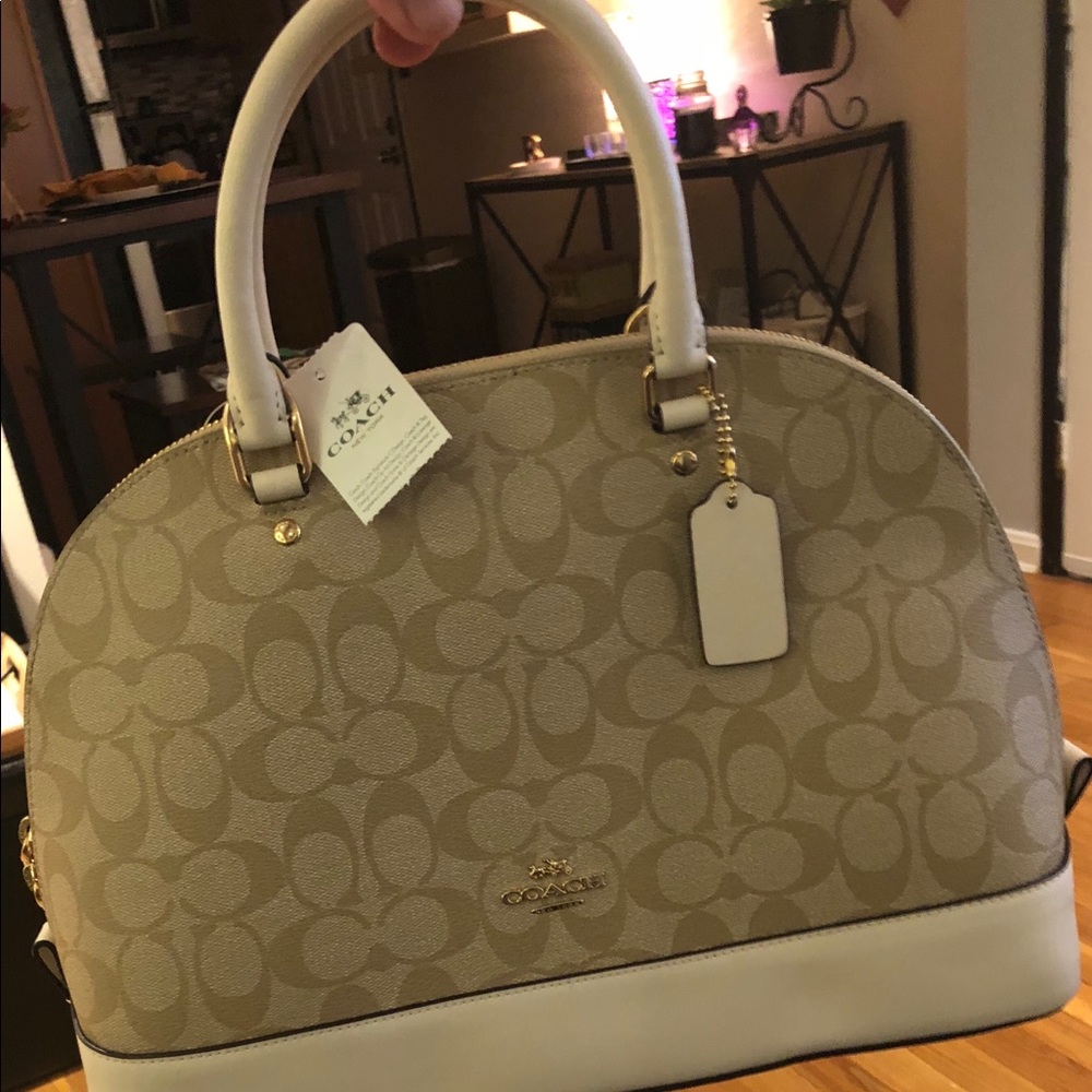 Coach chic zipper closed and strap included purse